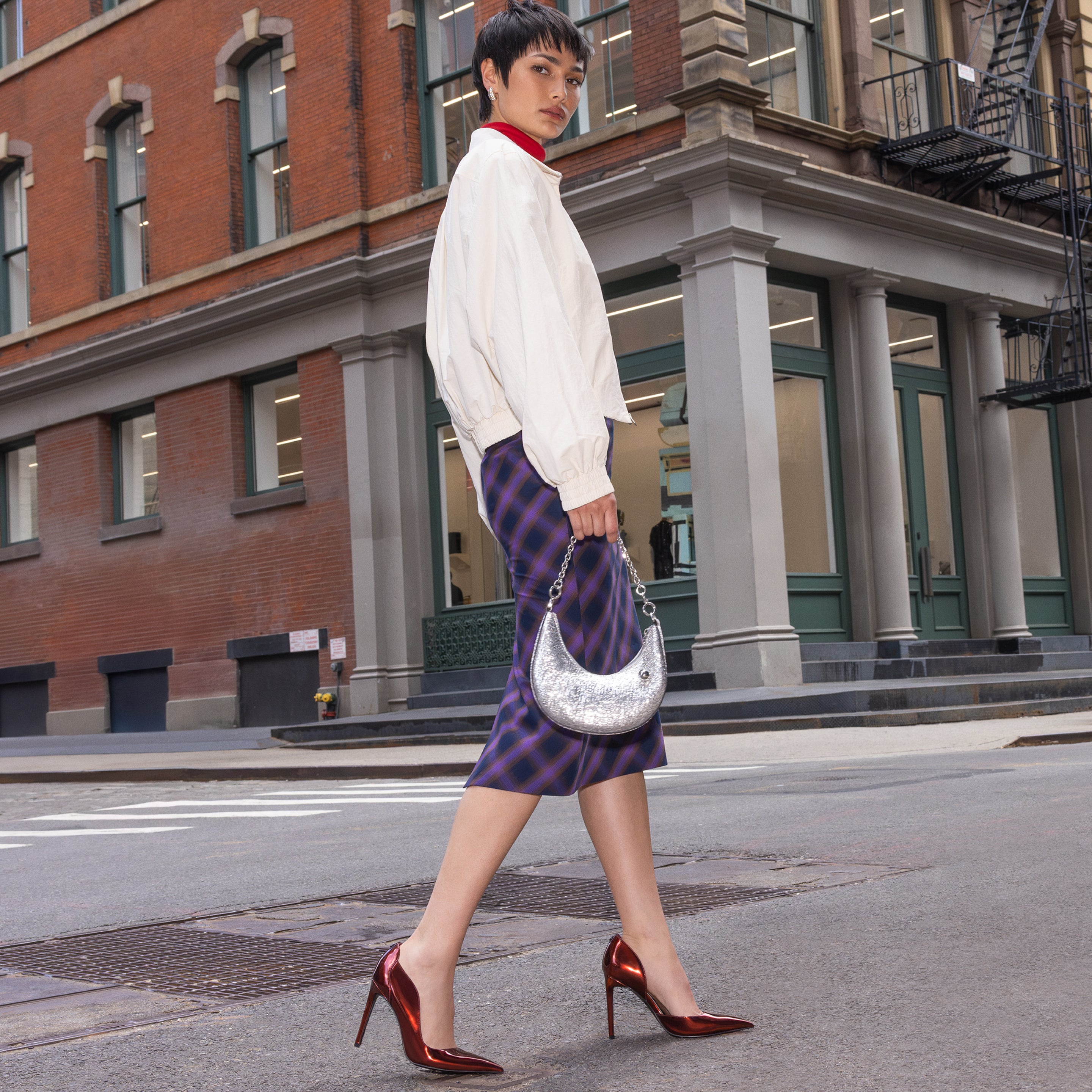 Editorial banner featuring model wearing pumps