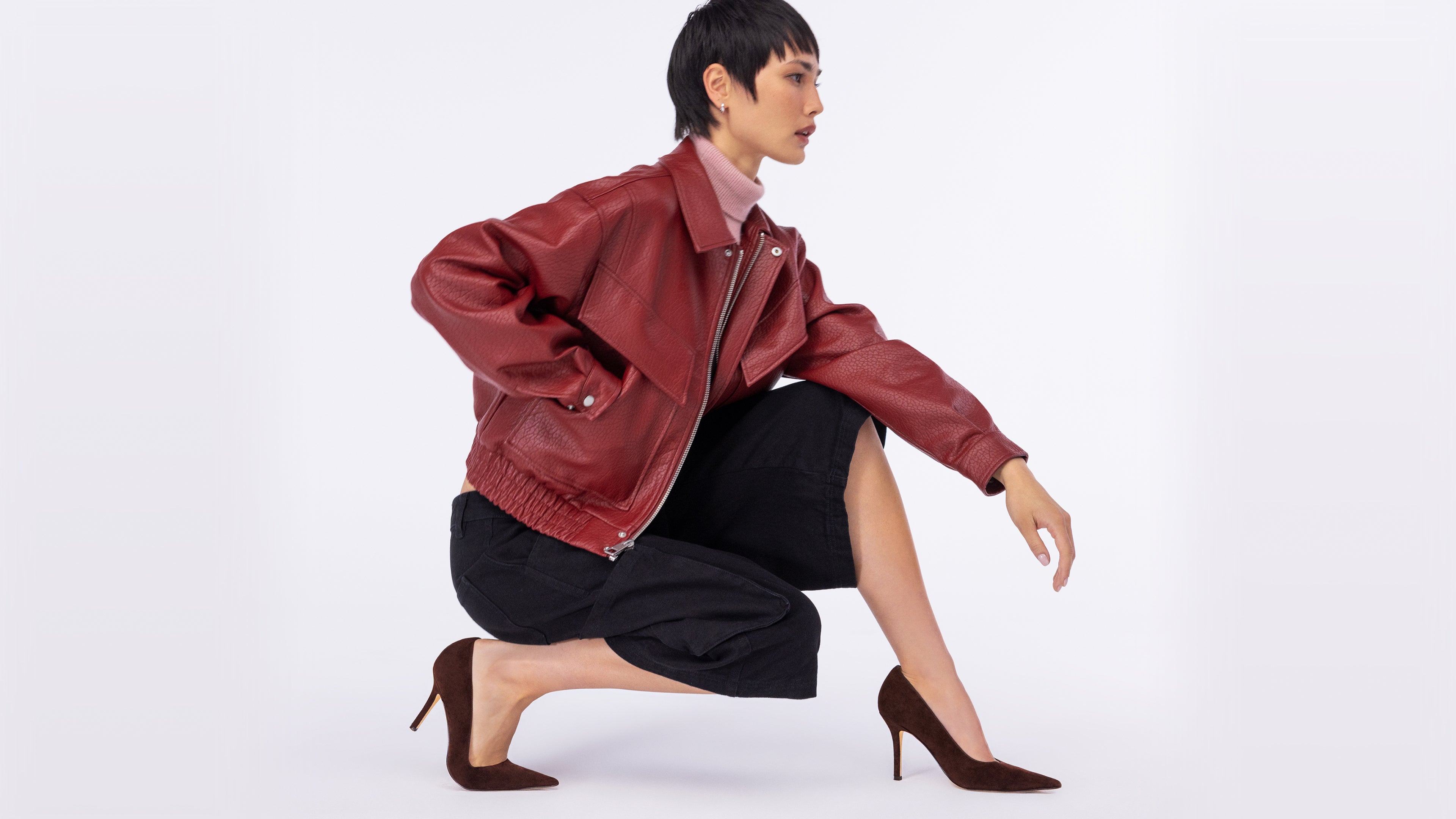 Editorial banner featuring model wearing pumps