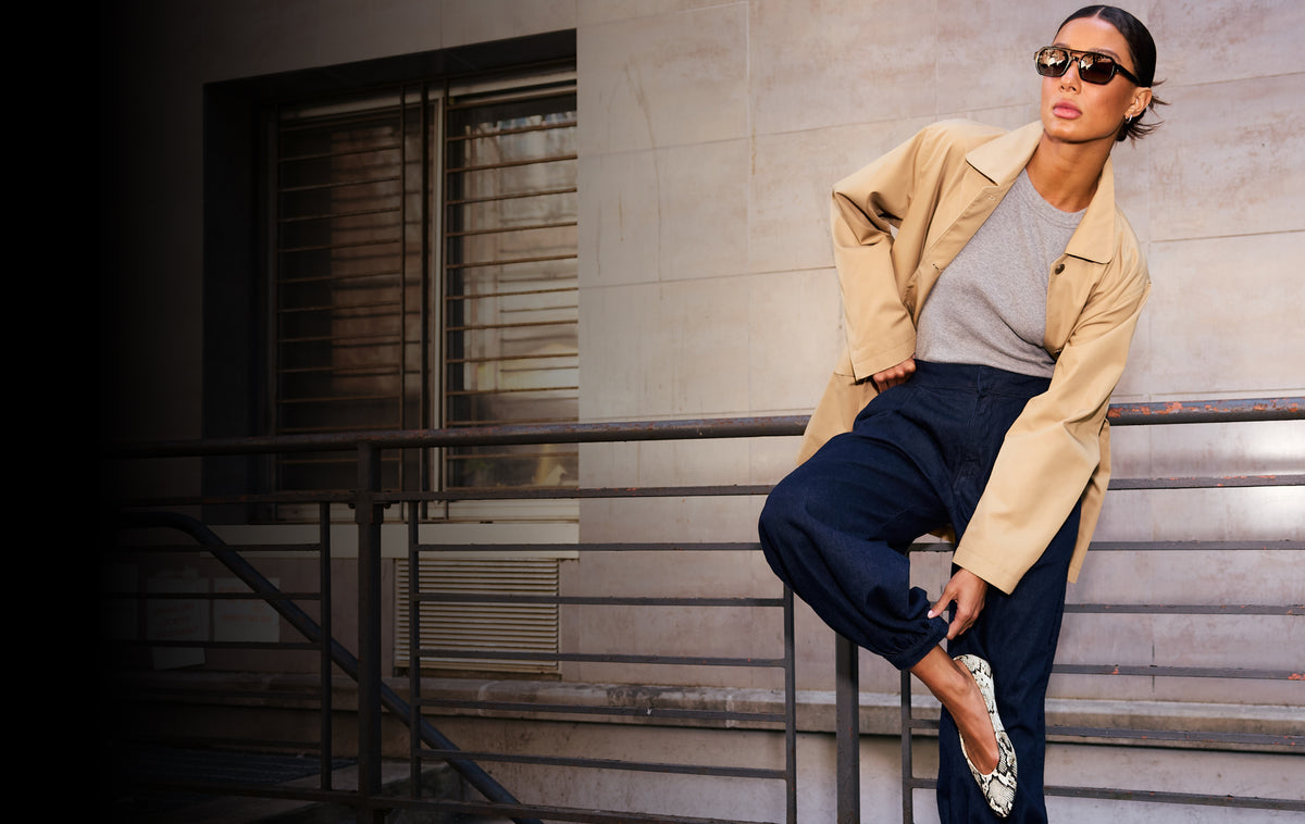 Editorial banner featuring model wearing Flats