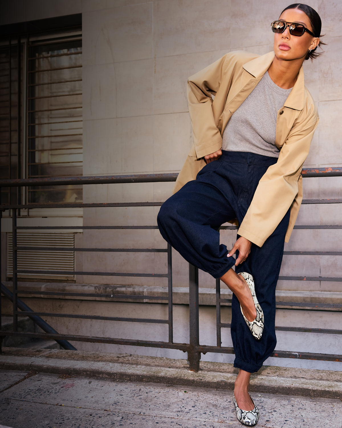 Editorial banner featuring model wearing Flats